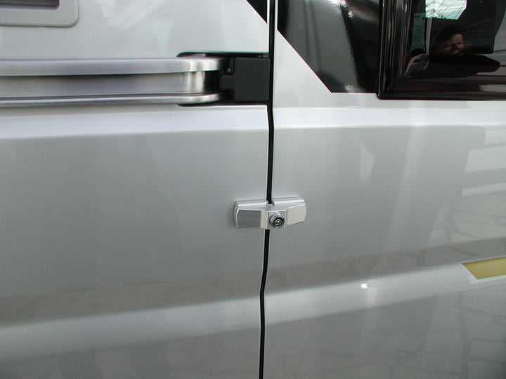 Universal surface-mounted lock for sliding and rear doors